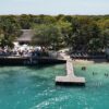 Aerial view of Capri Beach Club pier and turquoise water, Rosario Islands