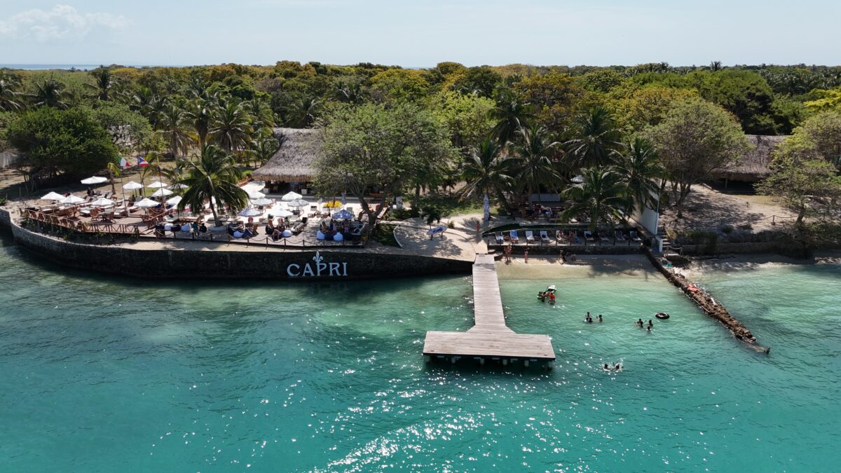 Aerial view of Capri Beach Club pier and turquoise water, Rosario Islands
