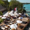 Aerial view of beach umbrellas and loungers at Capri Beach Club