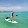 Paddle boarding in the clear Caribbean water off Ibbiza Island