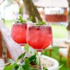 Red tropical cocktails served at Ibbiza Island Beach Club