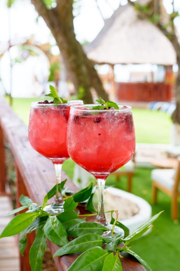 Red tropical cocktails served at Ibbiza Island Beach Club