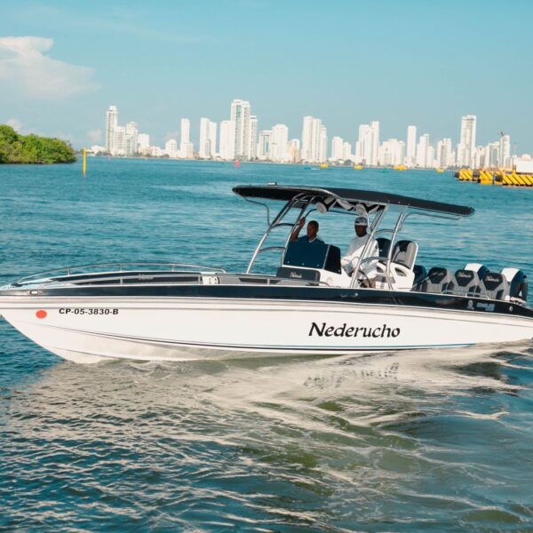 28 ft private boat Nederucho cruising in Cartagena Bay with the Bocagrande skyline