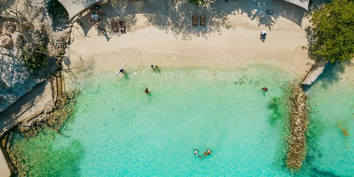 Aerial view of the natural pool at Paue Beach Club