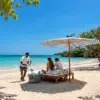 Beach service under an umbrella at Aguazul Beach Resort