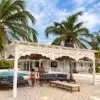 Beach gazebo with daybed at Aguazul Beach Resort