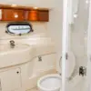 Bathroom with sink and glass shower on the Bellajava yacht