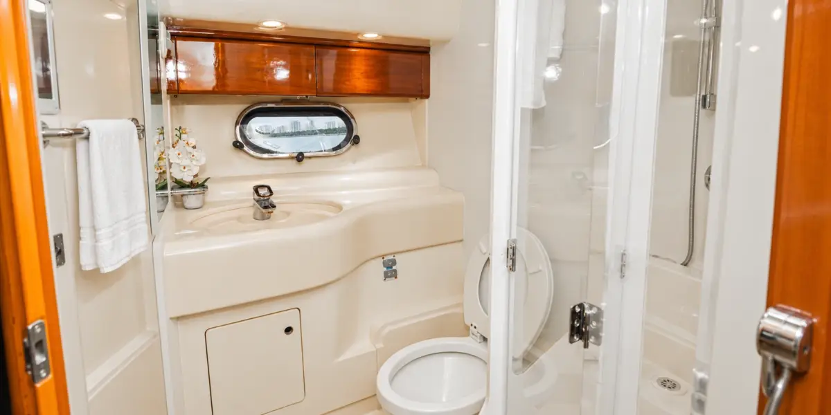 Bathroom with sink and glass shower on the Bellajava yacht