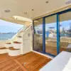 Teak aft deck and stairs to the flybridge on the Bellajava yacht