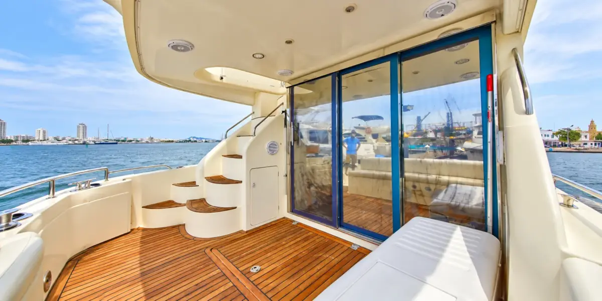 Teak aft deck and stairs to the flybridge on the Bellajava yacht