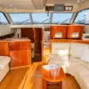 Salon with sofas and panoramic windows on the Bellajava yacht