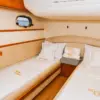 Guest cabin with two single beds on the Bellajava yacht