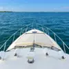 Bow of the Bellajava yacht sailing toward the Rosario Islands