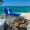 Blue sun loungers on the dock at Coralina Island