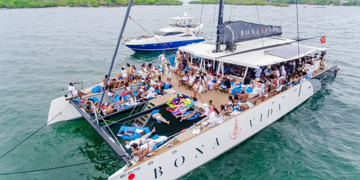 Passengers on the deck of the Bonavida catamaran