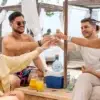 Friends toasting at Bora Bora Beach Club