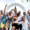 Group of friends at the Bora Bora Beach Club arch