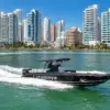 Catalunya boat cruising past the Bocagrande towers in Cartagena