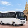 Exterior of the Coaster bus used for group transfers in Cartagena