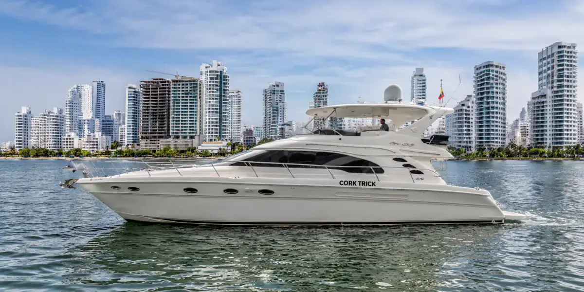 Cork Trick 56 ft Sea Ray flybridge yacht cruising off Bocagrande, Cartagena