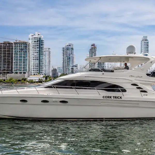 Cork Trick 56 ft Sea Ray flybridge yacht cruising off Bocagrande, Cartagena