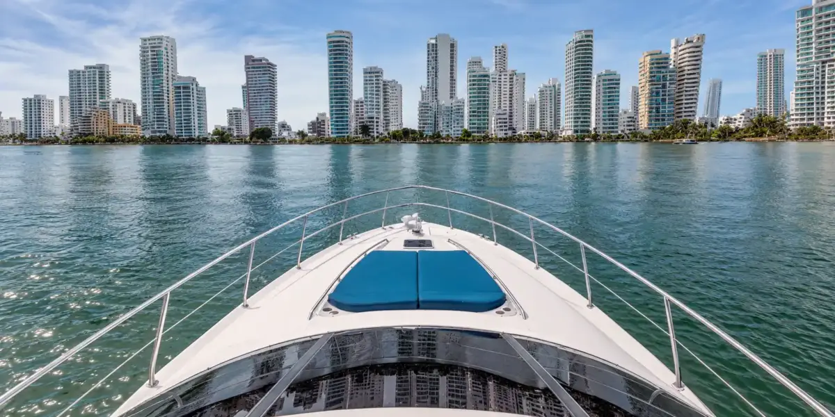 Bow sunbed of the Cork Trick yacht facing the Bocagrande skyline