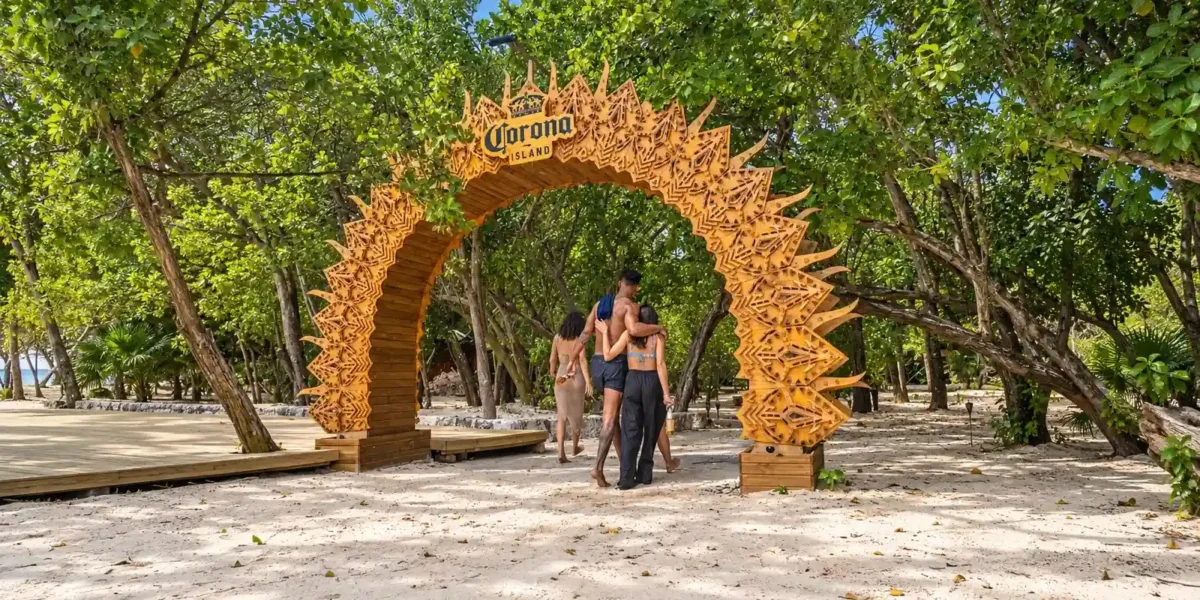 Couple at the Corona entrance arch on Corona Island