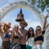 Friends at the Bora Bora Beach Club entrance arch