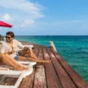 Guest relaxing on the wooden deck at Isla Gigi