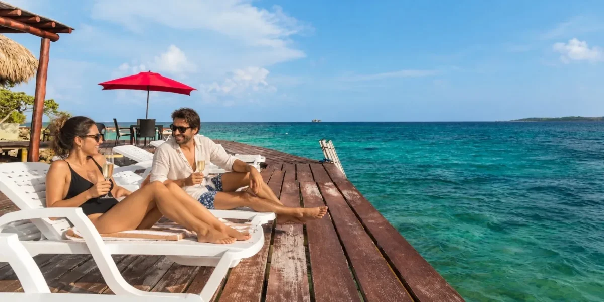 Guest relaxing on the wooden deck at Isla Gigi