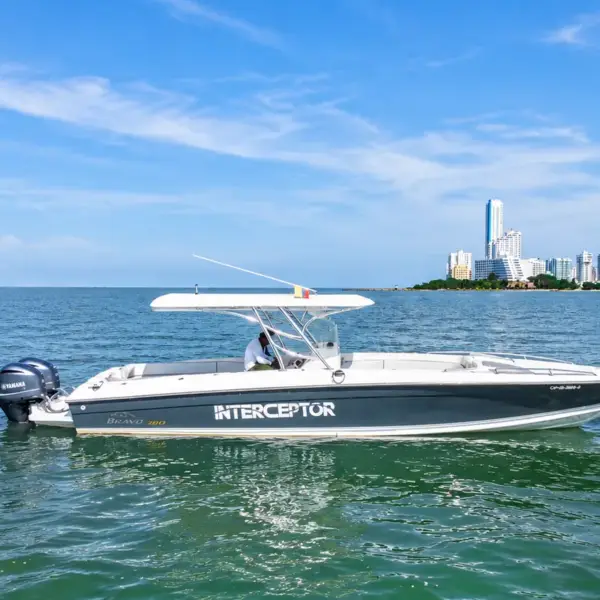 Interceptor 38 ft private boat anchored in Cartagena Bay with the Bocagrande skyline