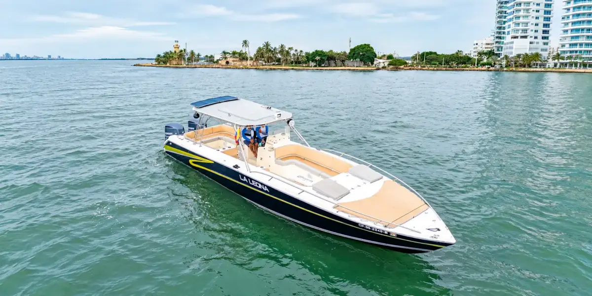 La Leona private boat with tan seating anchored near Castillogrande, Cartagena