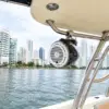 Marine speaker on the hardtop of La Leona with the Bocagrande skyline