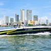 La Leona private boat cruising past the Bocagrande skyline