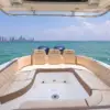 Cockpit and twin engines of the Makani boat with the Cartagena skyline