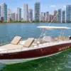 Makani boat with leather sunbeds in front of Bocagrande