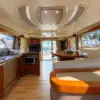 Salon with galley and dining area on the Mama's yacht