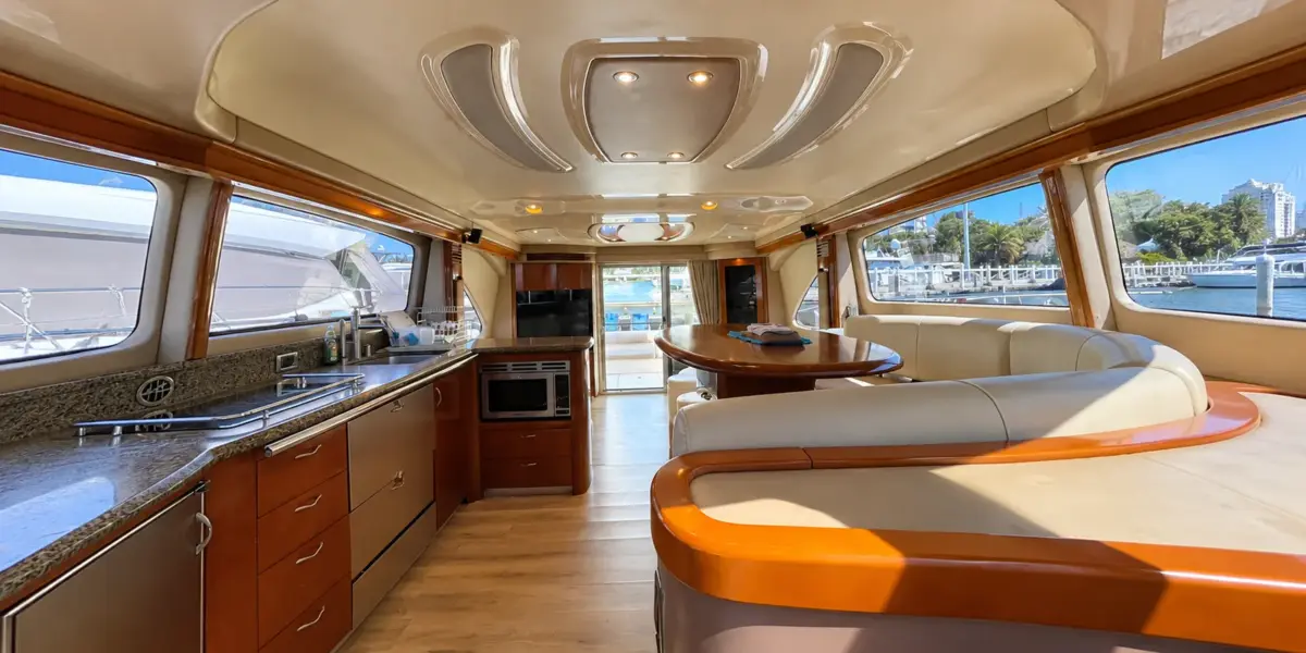 Salon with galley and dining area on the Mama's yacht