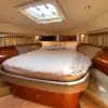 Master cabin with double bed and skylight on the Mama's yacht
