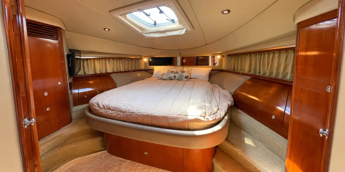 Master cabin with double bed and skylight on the Mama's yacht
