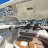 Flybridge lounge with seating and sound system on the Mama's yacht