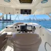 Flybridge helm station with captain seats on the Mama's yacht
