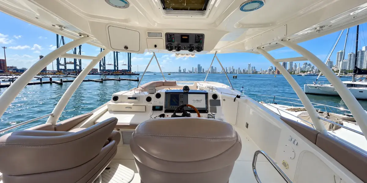Flybridge helm station with captain seats on the Mama's yacht