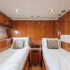 Guest cabin with two single beds on the Martlet yacht