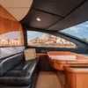Upper lounge with leather sofa and a view of the old city on the Martlet yacht