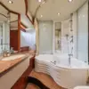 Master bathroom with jacuzzi on the Martlet yacht