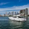 Martlet yacht cruising in front of the Bocagrande skyline, Cartagena