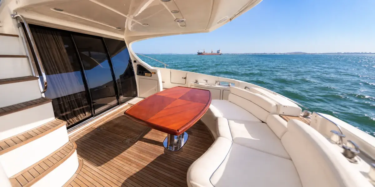 Aft deck with dining table on the My Toy yacht