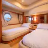 Guest cabin with two single beds on the My Toy yacht
