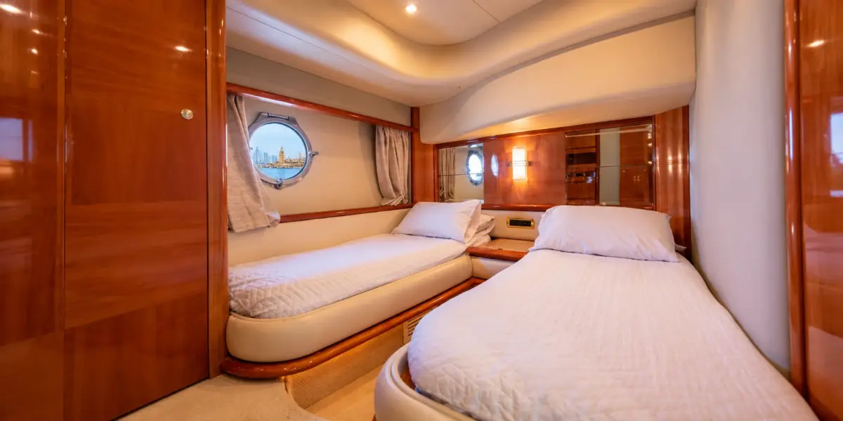 Guest cabin with two single beds on the My Toy yacht